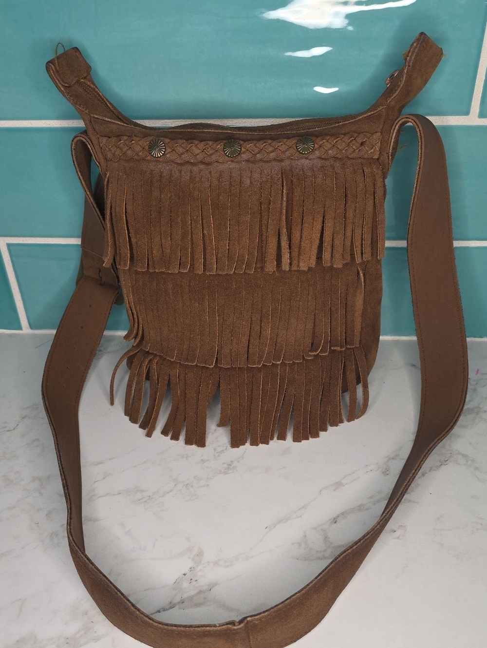 Minnetonka Fringed Suede Crossbody Bag in Brown